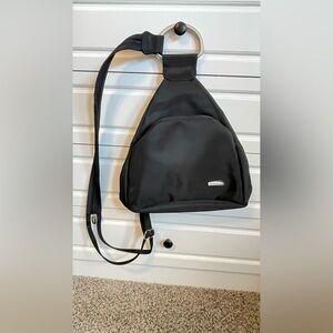 GREAT USED Travelon Black Sling Crossbody Backpack convertible travel Bag.Unisex